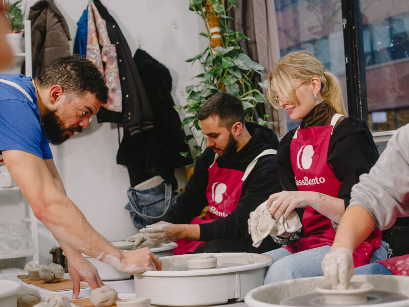 A group of people at a pottery class